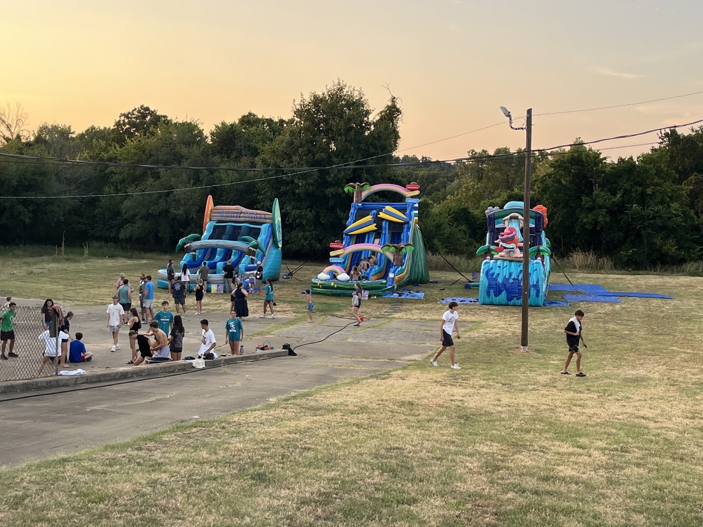 BISON water slides at an evening event